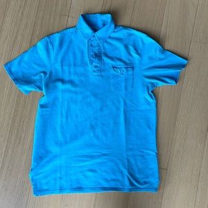 Folded and Hung Light Blue Polo Shirt